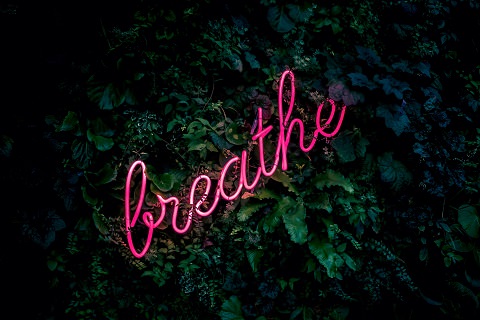 Breathe written in pink