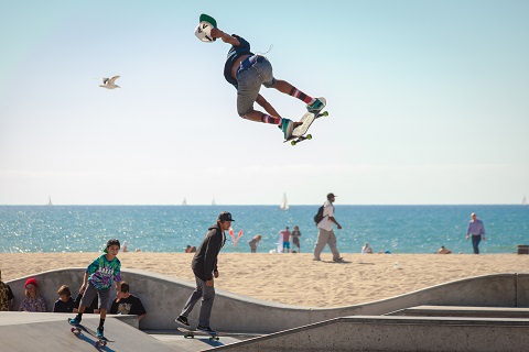 A young man skateboarding