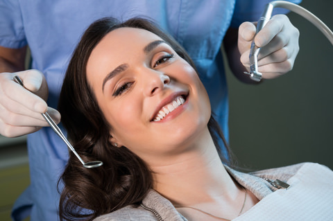 A lady visiting her dentist