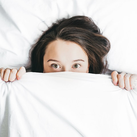 A lady under the covers feature for sleep dentistry