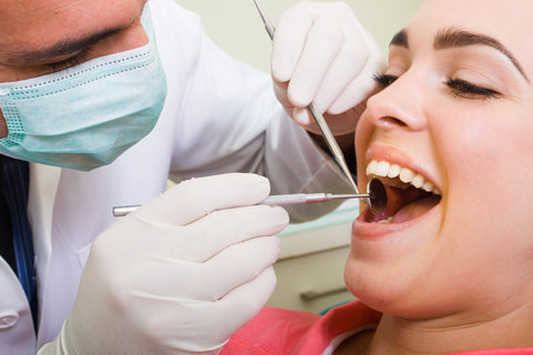 A young lady having a dental checkup