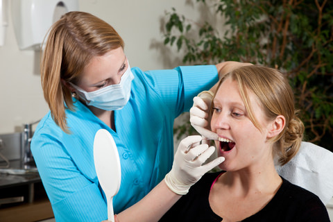 A woman having a dental checkup