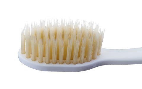 A Close up of a Mouthwatchers Toothbrush