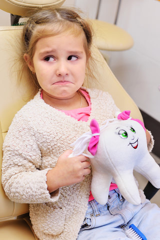 A child not happy at the dentist