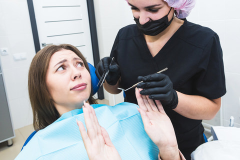 Does a dental clean hurt?