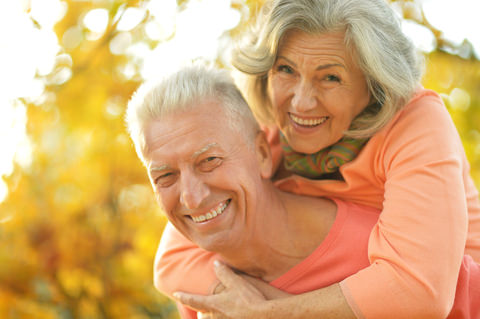 Seniors enjoying life with good teeth