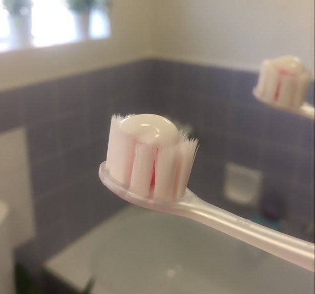 Using Colgate Total 12 Toothpaste