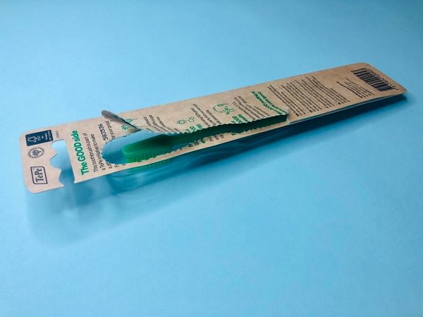TePe Good™ Toothbrush is housed securely