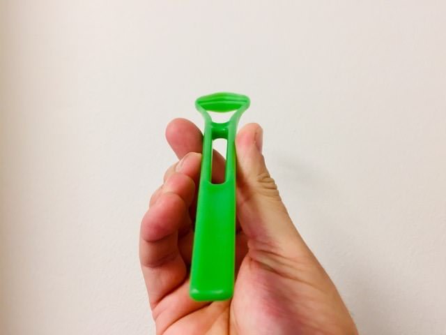 A long profile view of the GOOD™ Tongue Cleaner