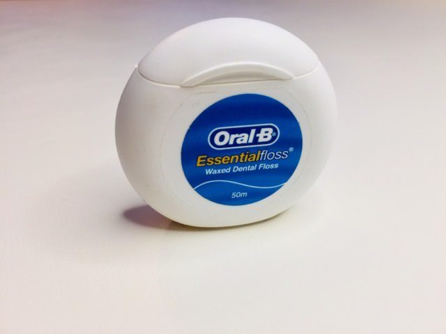 oral-b essential floss review