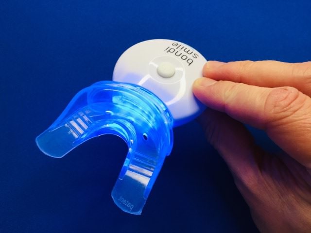 using the LED light out of the bondi smile whitening kit