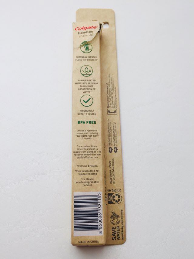 Details on the back of the colgate bamboo charcoal toothbrush