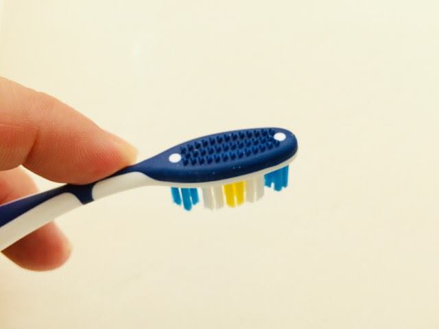 The tongue cleaner on the Dentitex Toothbrush