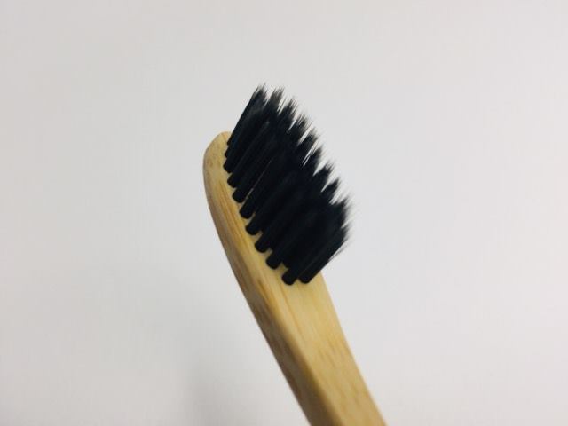 The charcoal enhanced bristles on the EcoToothbrush