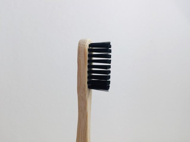 a closer look at the bristles and head of the kappi toothbrush