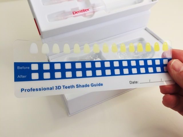 holding Aldi's Dentitex whitening kit shade guide