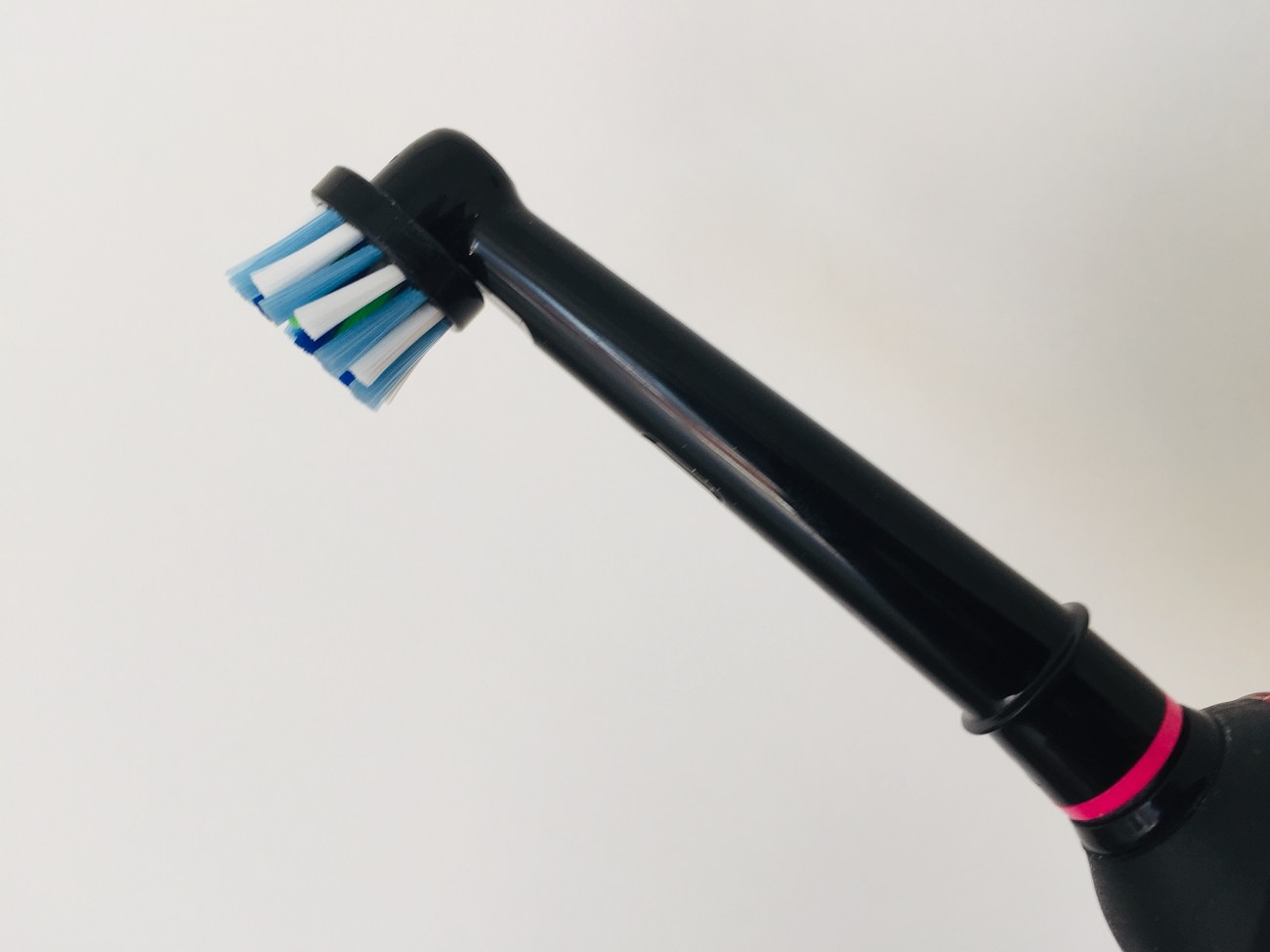 The CrossAction Brush head has angled bristles