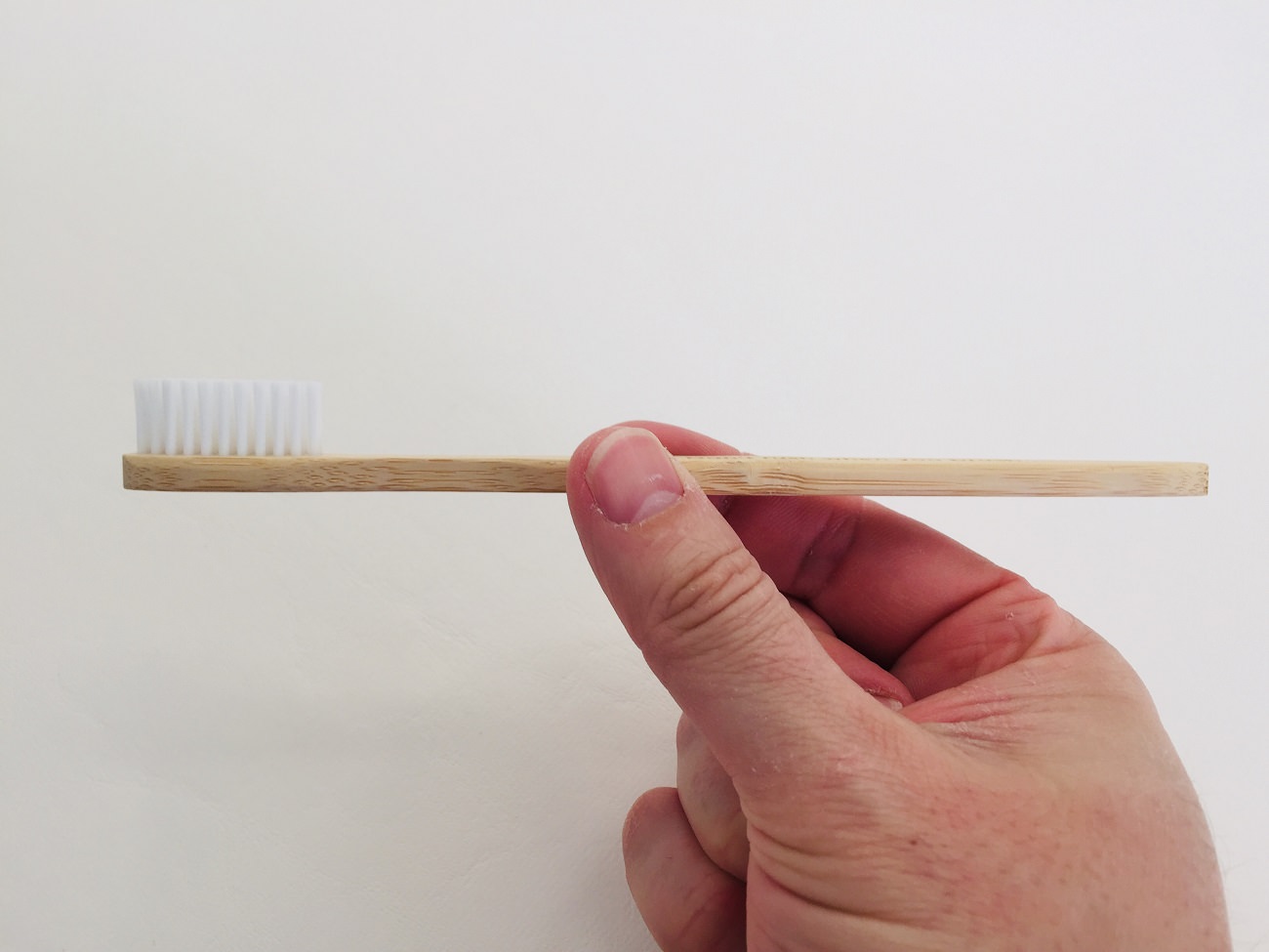 A side view of the Flora & Fauna Bamboo Toothbrush