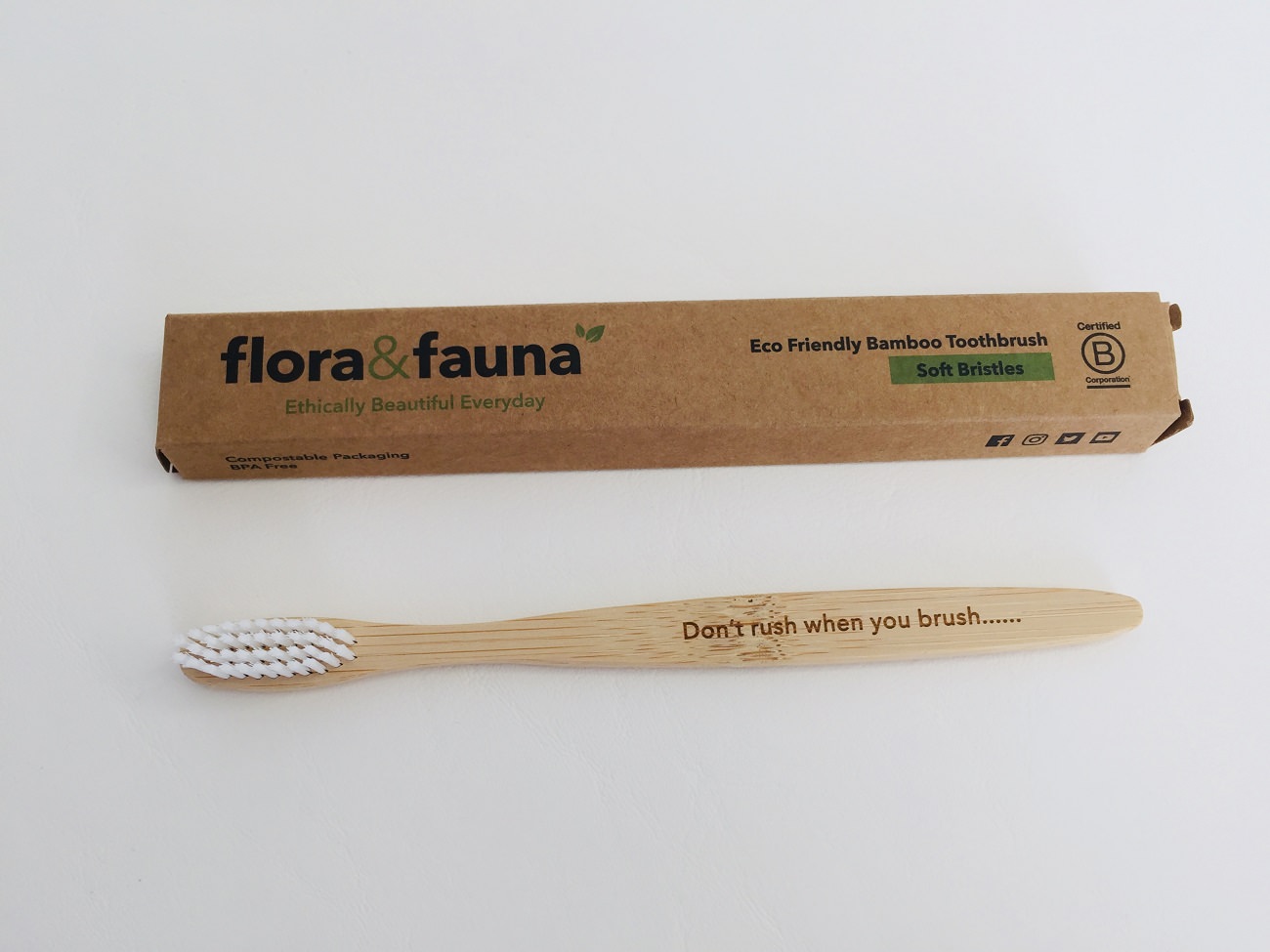 The Flora & Fauna Bamboo Toothbrush out of its packaging