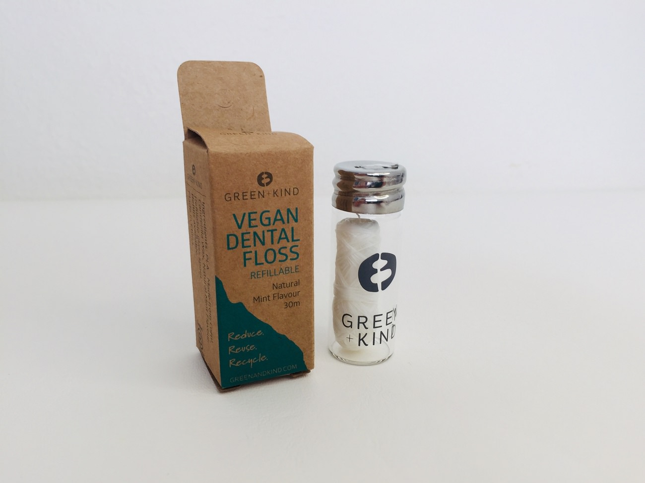 The Green + Kind Vegan Dental Floss and packaging
