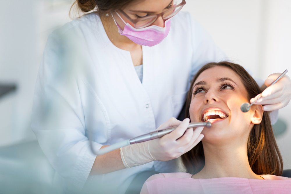 A lady having a professional dental clean done
