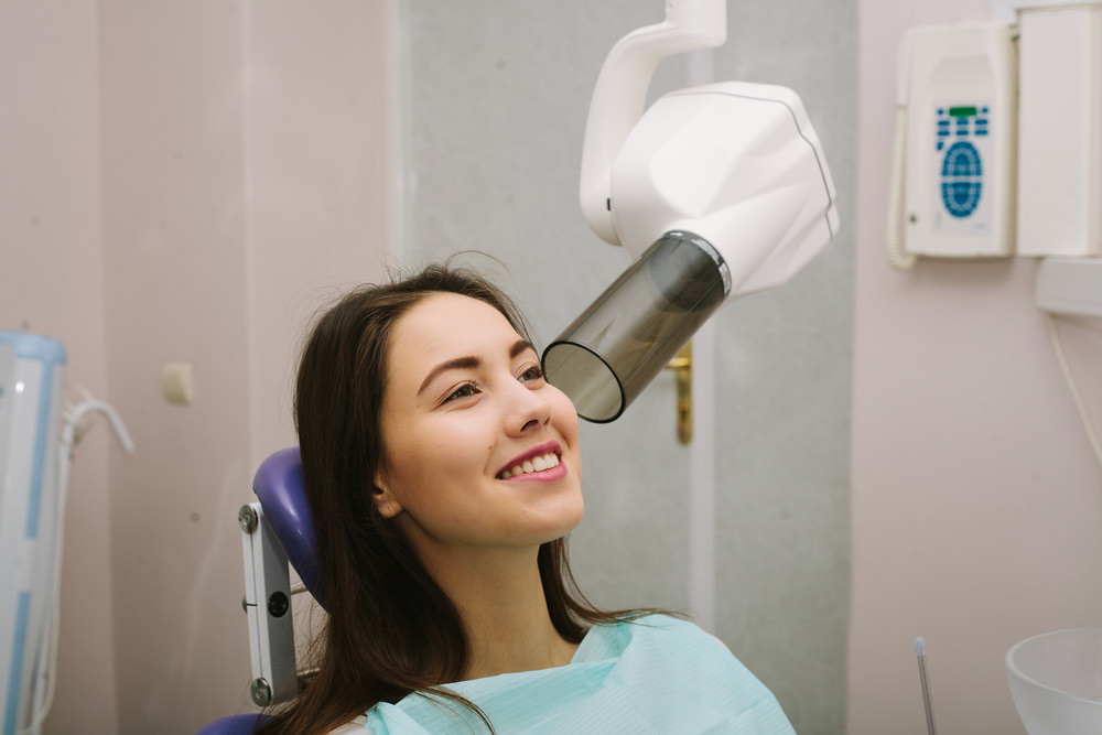 A student having an X-Ray taken