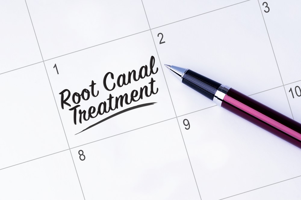 Writing a Root Canal Treatment appointment in a calendar