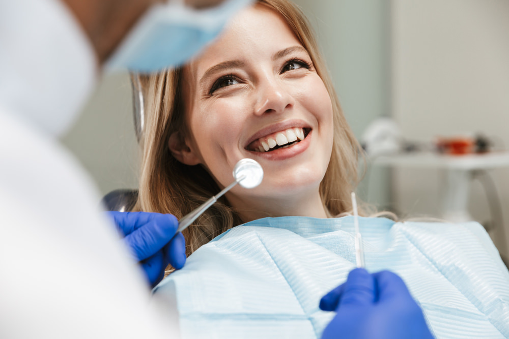 A lady seeing her dentist for a regular checkup