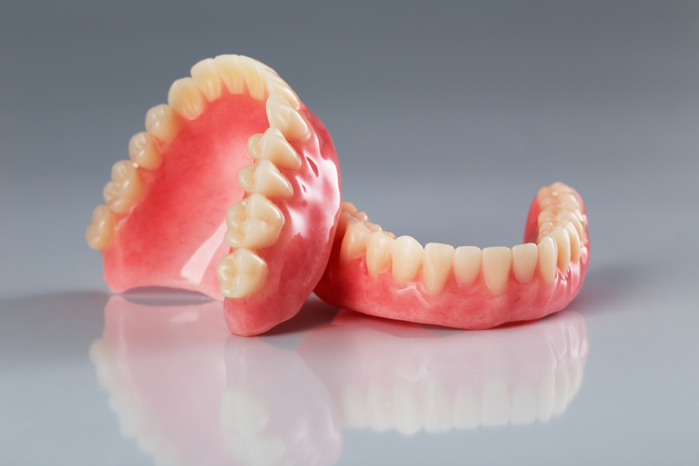 upper and lower sets of dentures