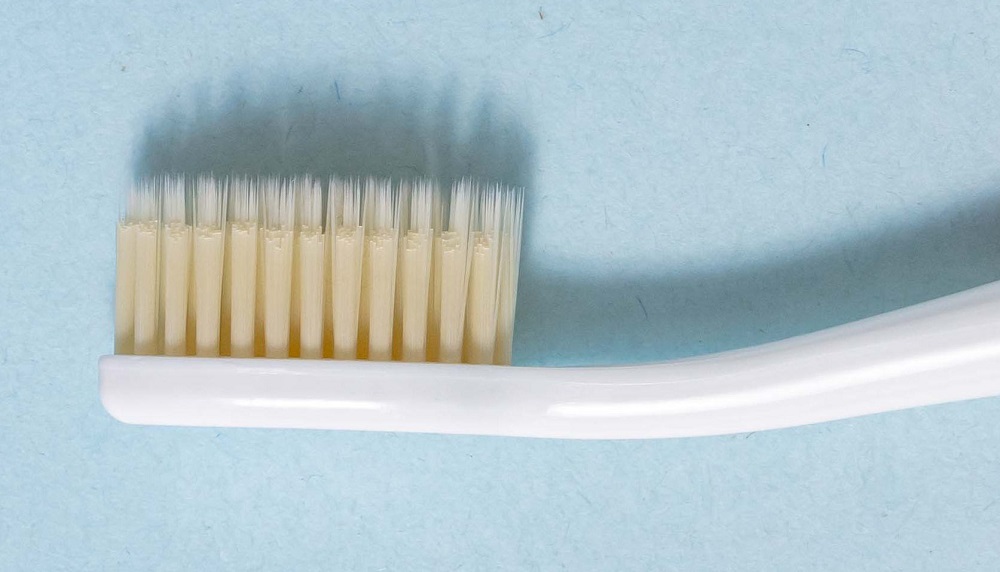 Close up photo of the Mouthwatchers toothbrush and its bristles